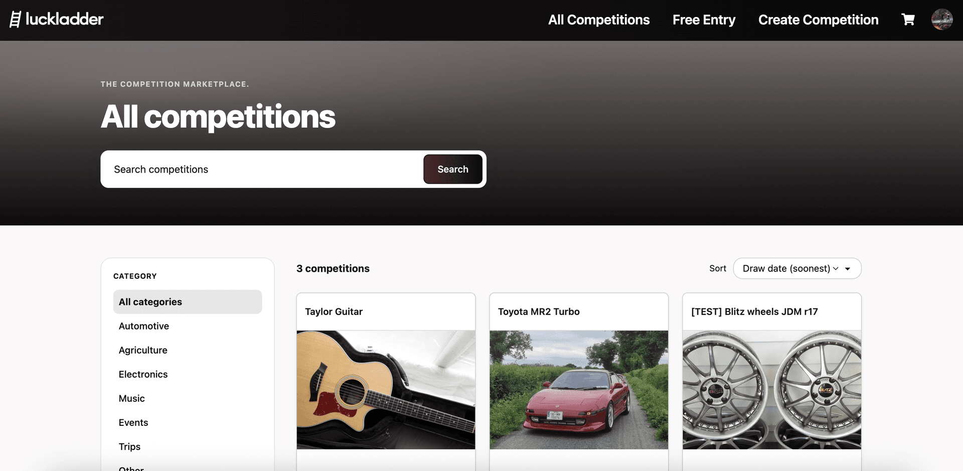 All competitions page with category filters and prize cards including Toyota MR2 Turbo
