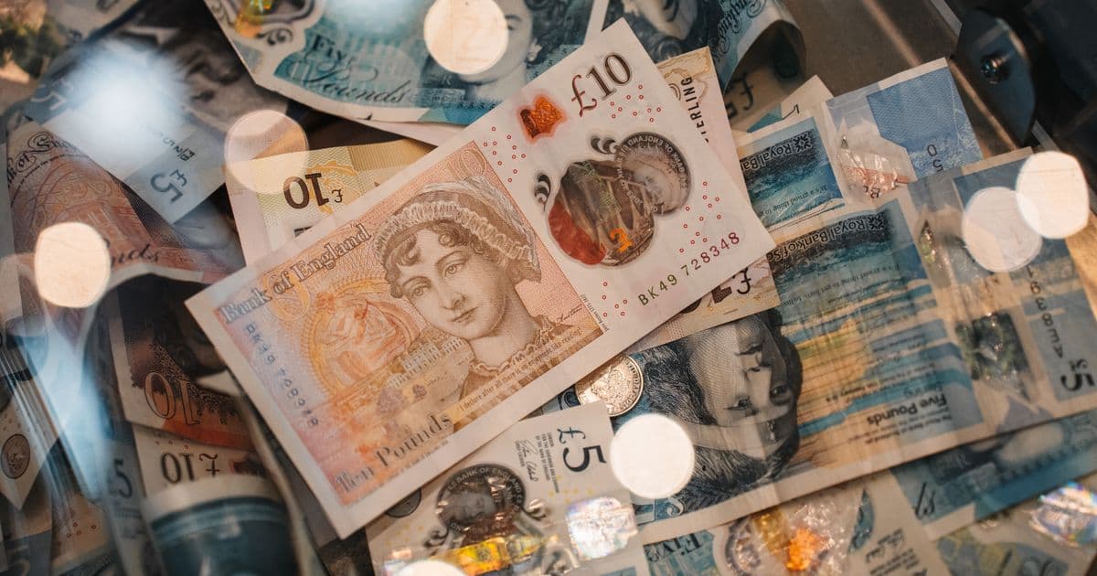 British pound coins and notes representing competition ticket revenue